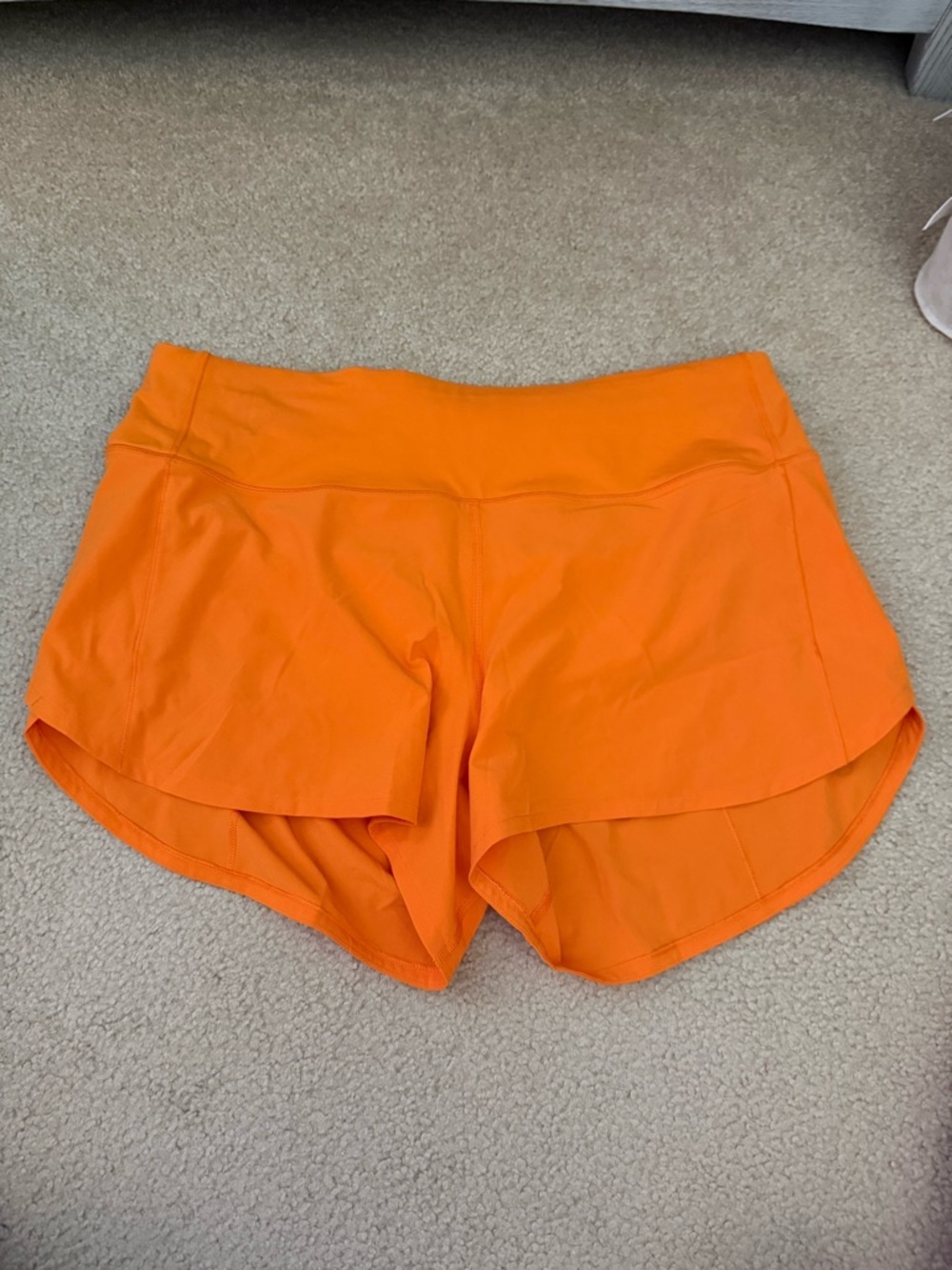 Lululemon orange speed up shorts 4 inch